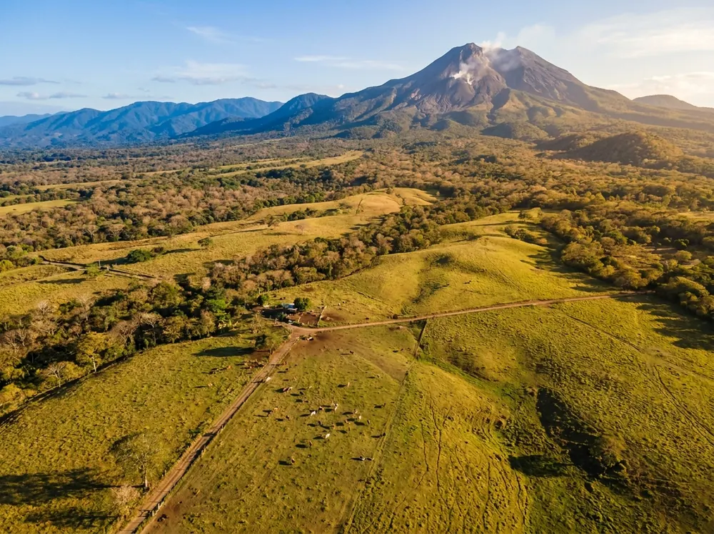 Rincón de la Vieja volcano rising over the Guanacaste plains near Liberia